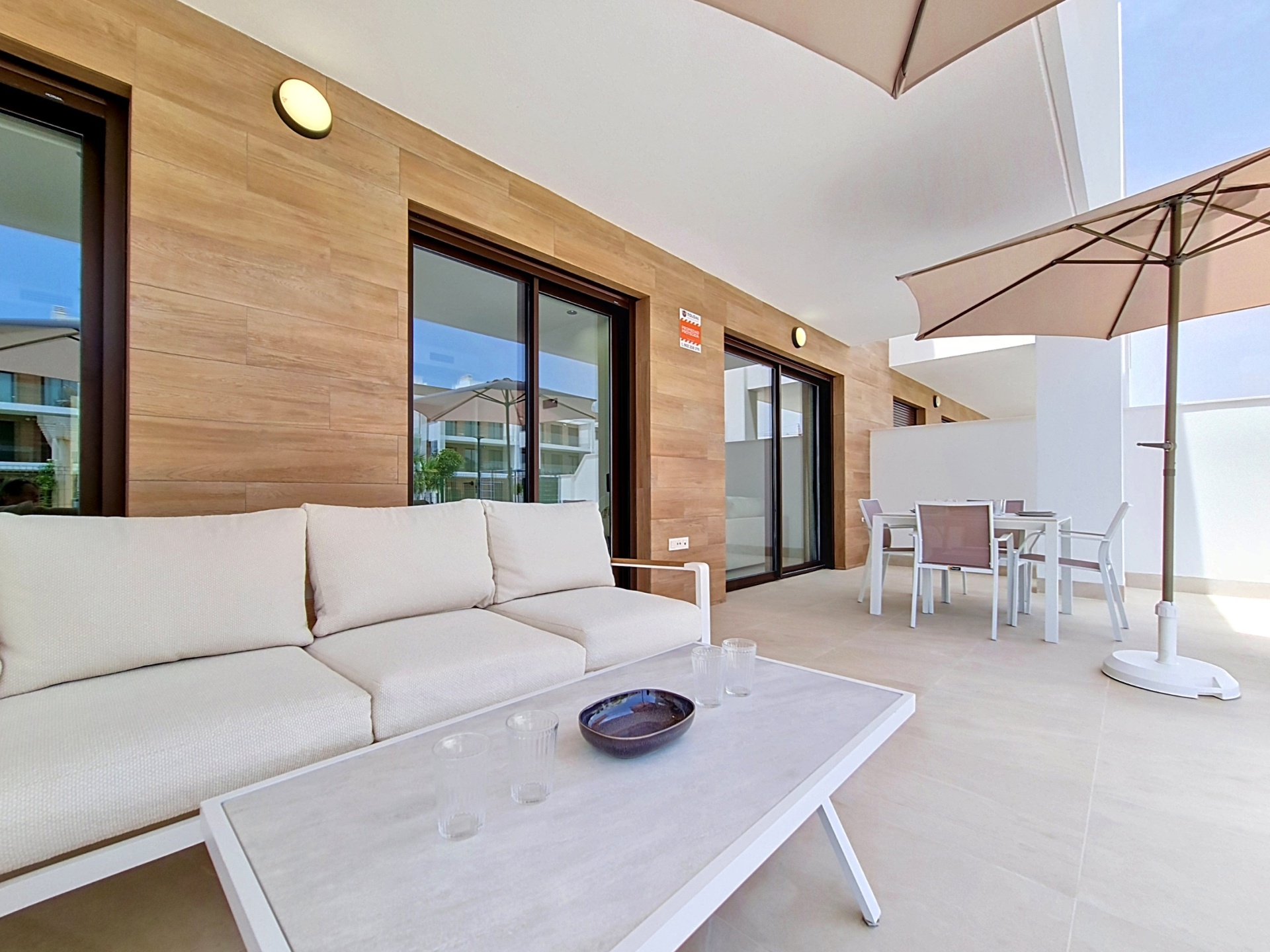 Terrace seating area beside the outdoor dining space
