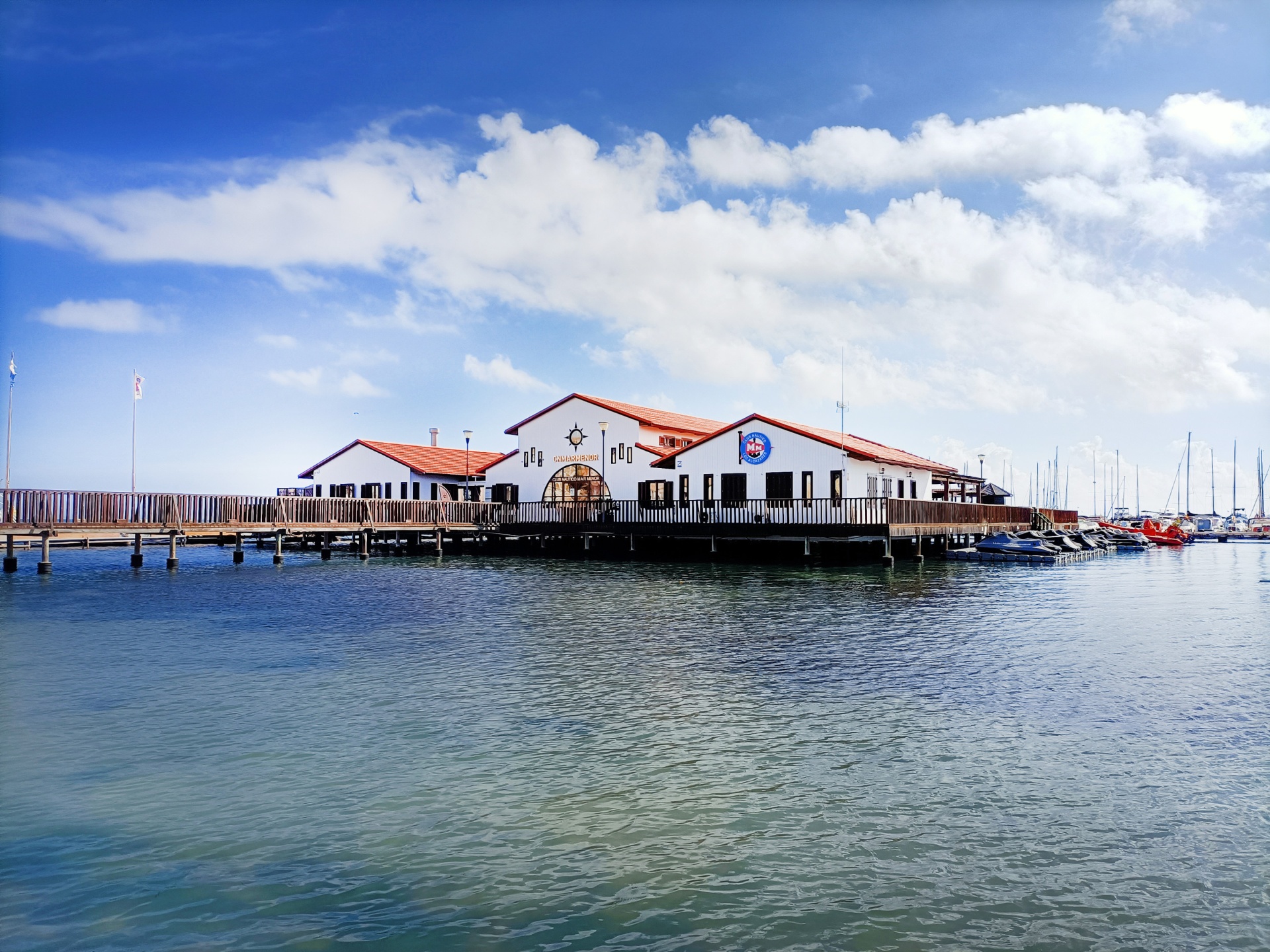 Waterside restaurant building on stilts at the marina