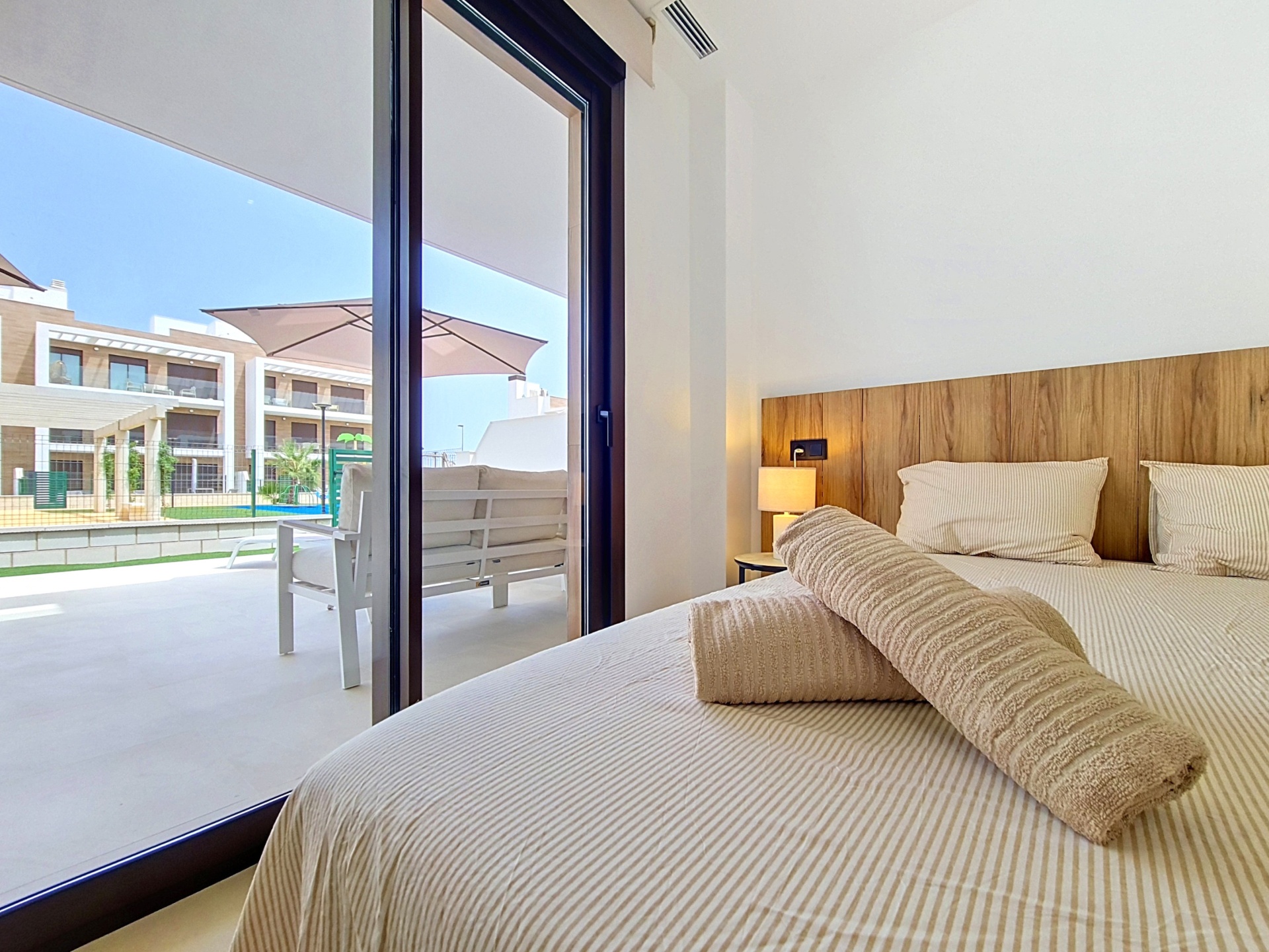 Second bedroom looking out towards the terrace seating area